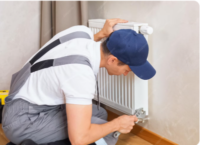 Radiator replacement-repairs-heating engineers work in progress