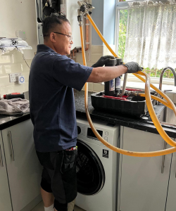 our-gas-eningeer-fixing-central-heating-power-flush-K-B-Plumbing-Heating.png